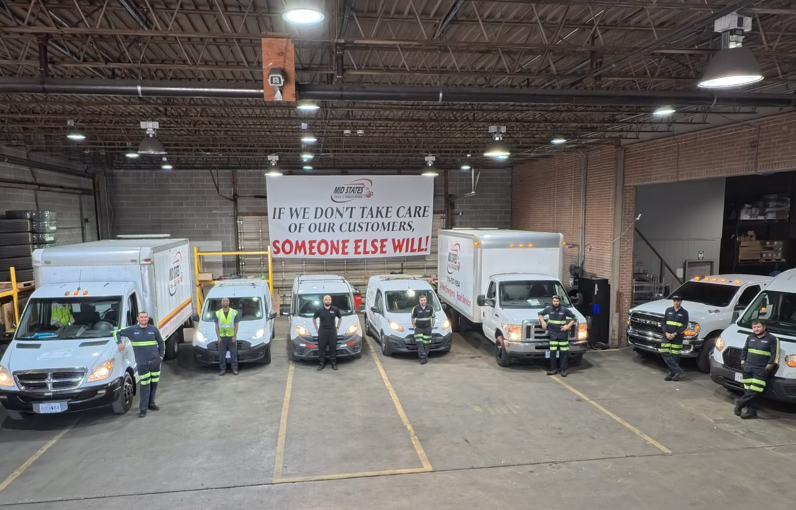 The Mid States Truck & Trailer Repair crew with their service fleet